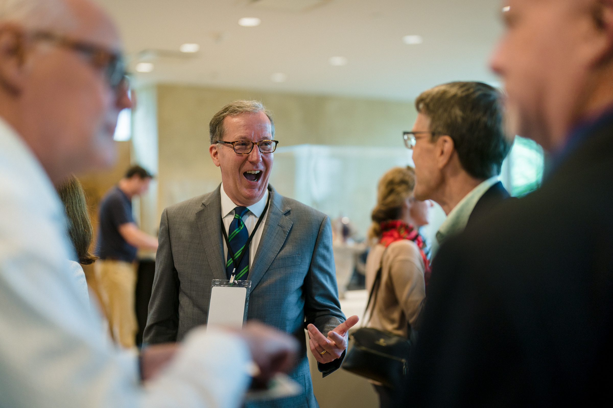 Participants mingle during the social hour