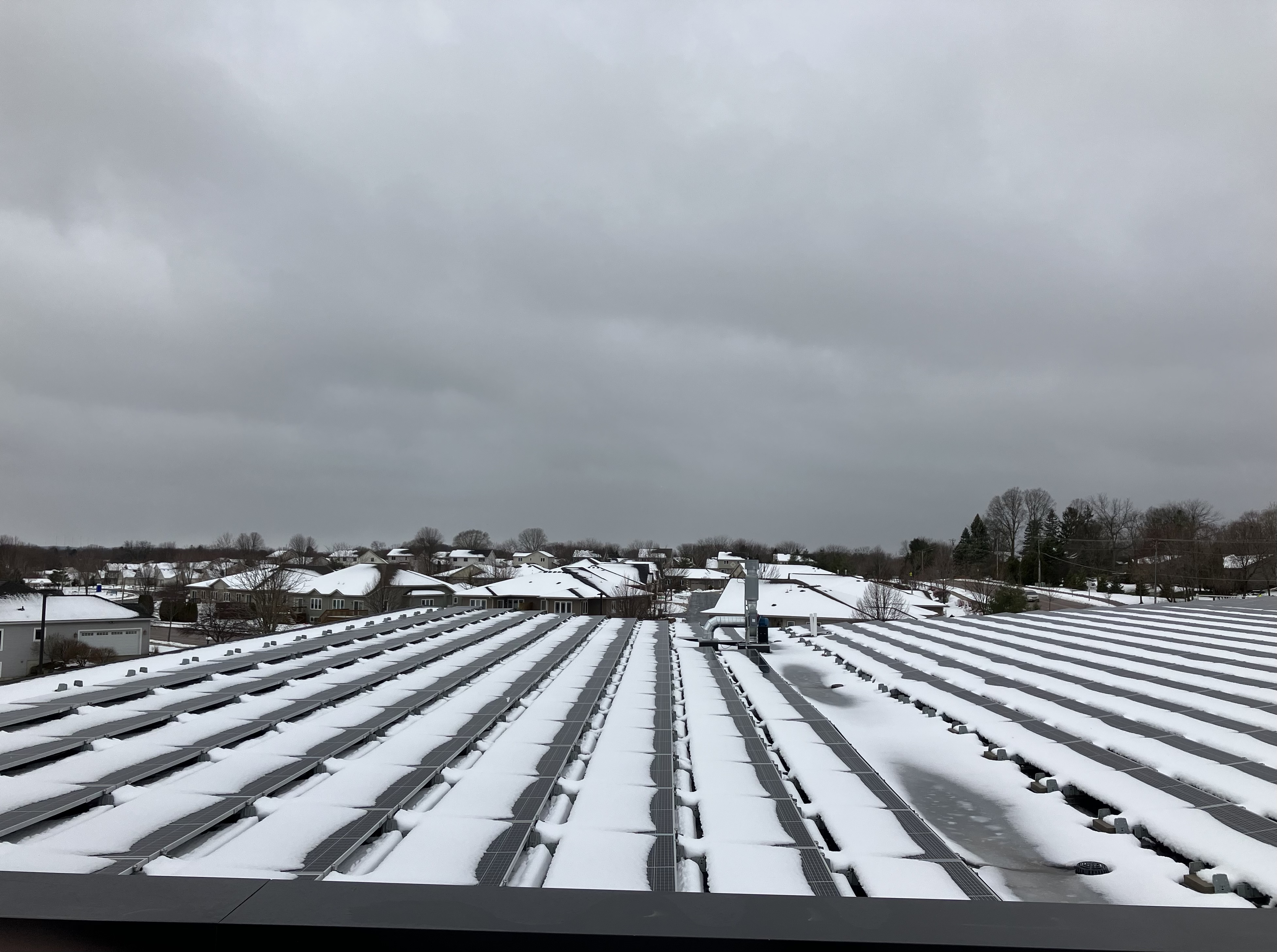 Rooftop solar panels with snow