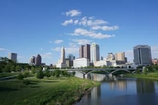 A view of a city with a bridge